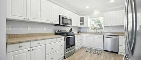 Maison, Plusieurs lits, patio, vue sur le fleuve (The Heron House) | Cuisine privée