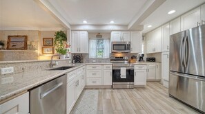 Fridge, microwave, oven, stovetop - Charming three bedroom home so close to Siesta Beach and Downtown (Sarasota)