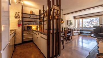 Family Condo, Balcony, Mountain View | Private kitchen | Fridge, oven, stovetop, dishwasher