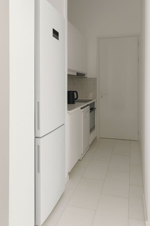 Luxury Villa, Balcony, Garden View | Private kitchen | Espresso maker, dining tables