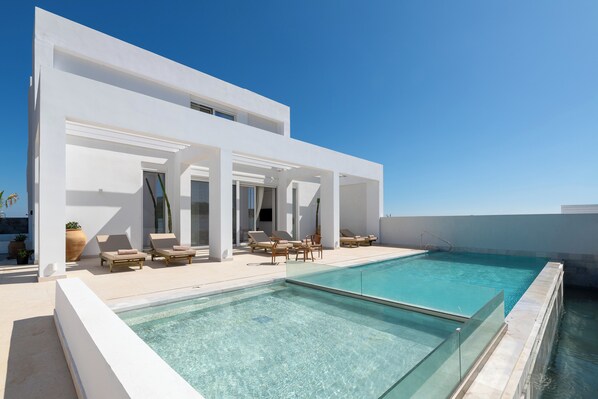 Outdoor pool, sun loungers