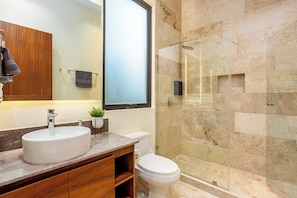 Shower, hair dryer, towels, soap