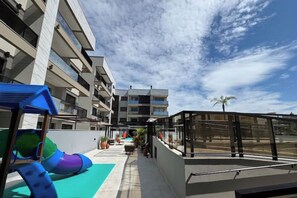 Children’s area - Apartment in Home Club with pool view - 550 meters from the sea (Governador Celso Ramos)