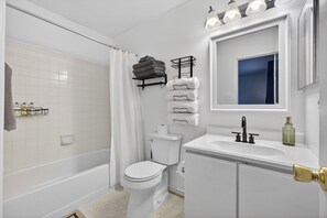 Hair dryer, towels, soap, shampoo