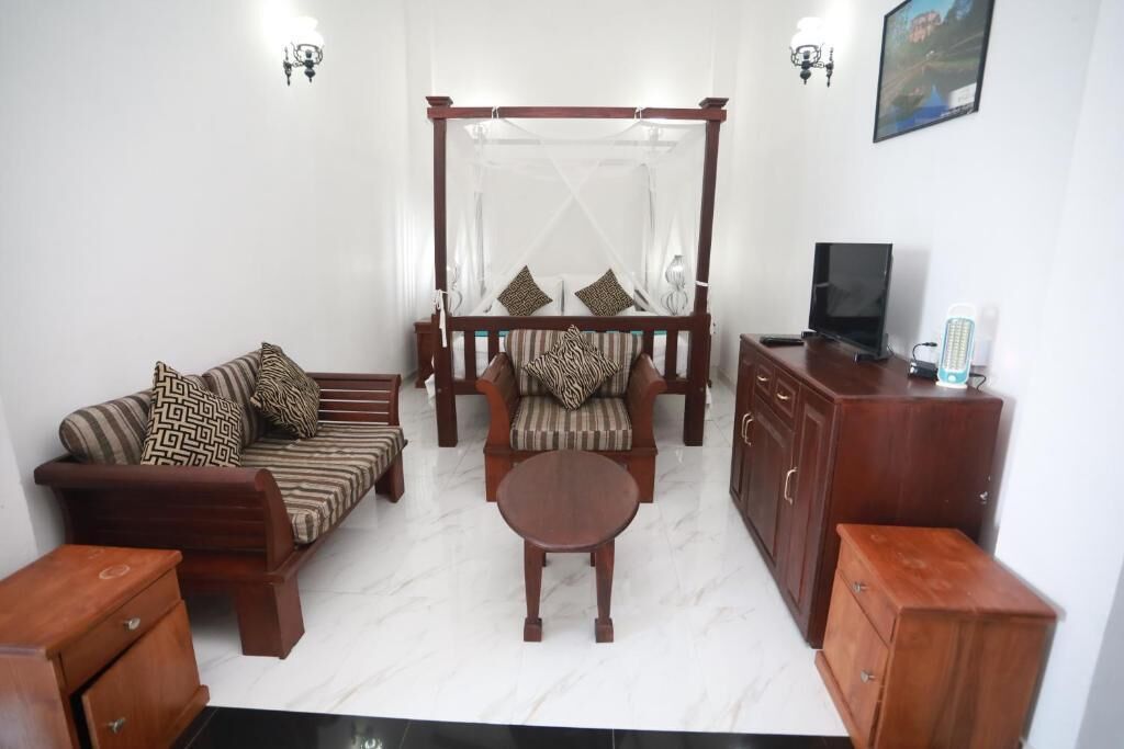 Quarto quádruplo família, sacada, vista para a montanha | Banheiro | Chuveiro, produtos de toalete grátis, secador de cabelo 