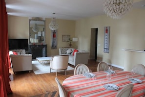 Deluxe Apartment | Living area | Fireplace