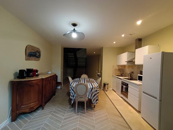 Deluxe Loft | Private kitchen | Full-size fridge, espresso maker, coffee/tea maker, electric kettle