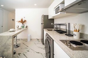 Fridge, microwave, stovetop, coffee/tea maker