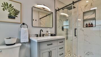 Shower, hair dryer, towels, soap
