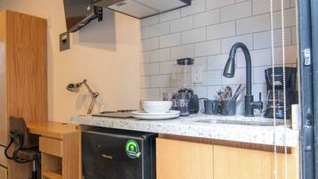 Standard Studio | Private kitchen | Microwave, stovetop, cookware/dishes/utensils