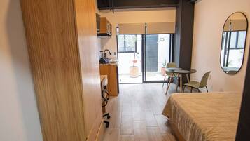 Standard Studio | Desk, blackout drapes, iron/ironing board, free WiFi