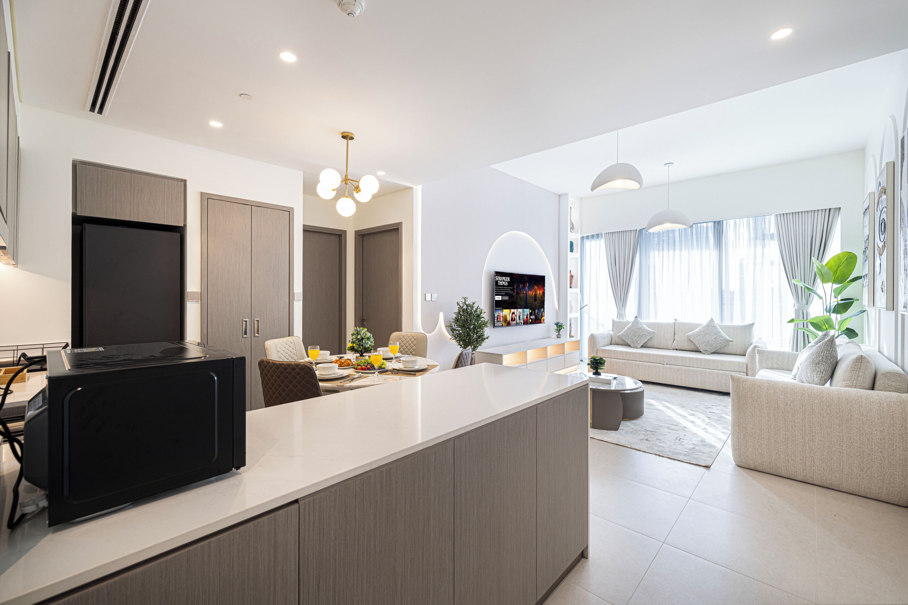 Luxury Apartment, 1 Bedroom, Sea View | Living area | 65-inch Smart TV with cable channels, Netflix, Hulu
