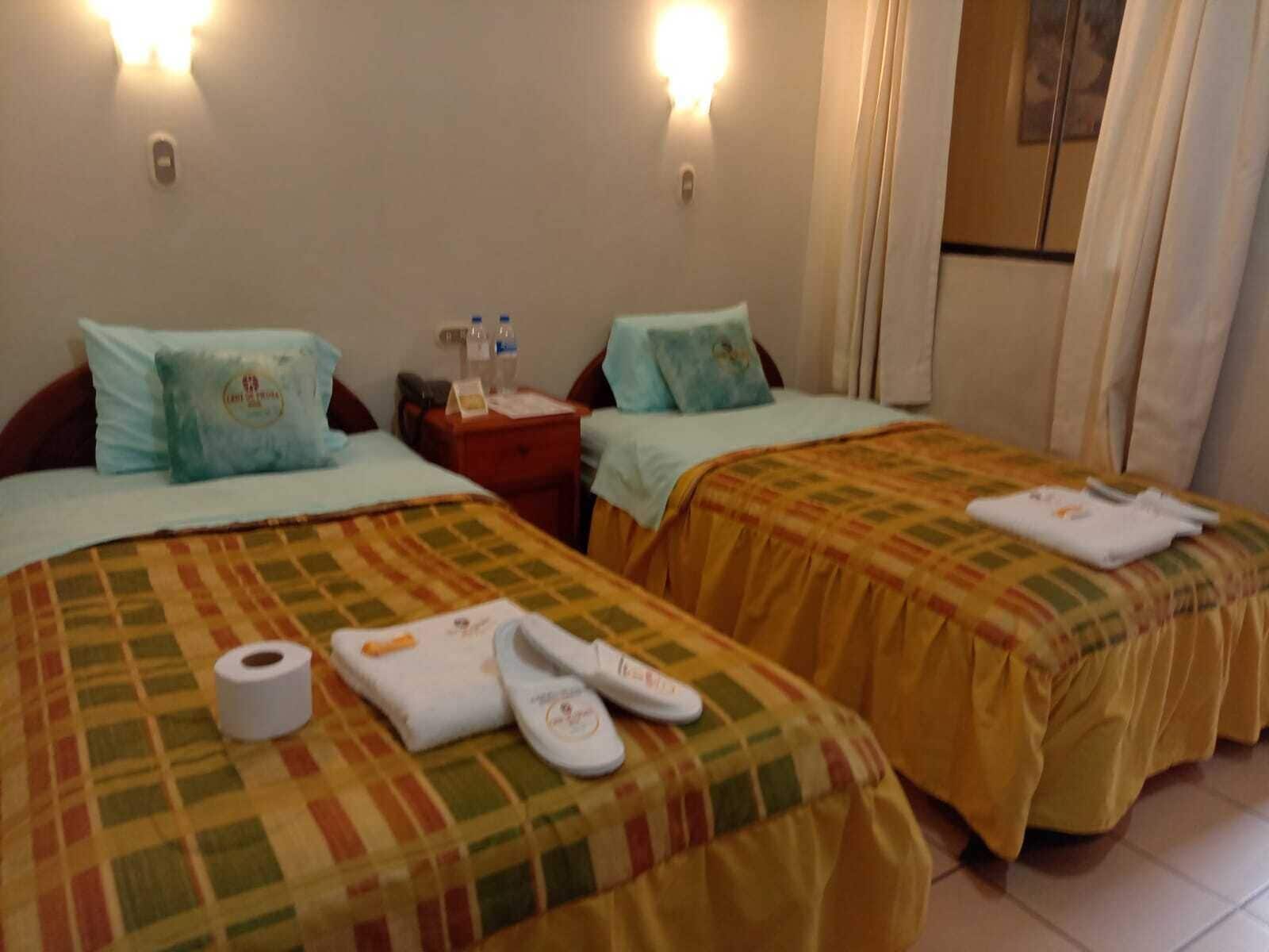 Værelse med 2 enkeltsenge | Skrivebord, strygejern/strygebræt, gratis Wi-Fi