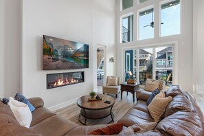 TV, fireplace - Catch, Paddle, Splash—Luxury 4BR on Lake Conroe (Willis)