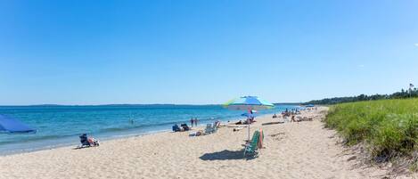 On the beach, sun loungers