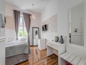 1 quarto, acesso à internet, roupa de cama