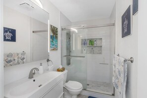 Hair dryer, towels, soap, shampoo