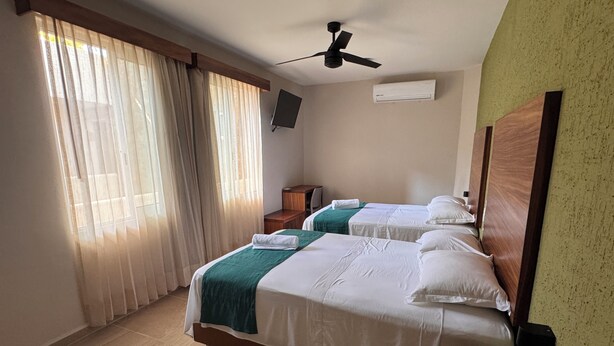 Kamar Double Standar | Wi-Fi gratis dan seprai linen