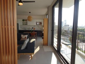 Deluxe Apartment, Balcony, Mountain View | Living area | 20-inch Smart TV with cable channels