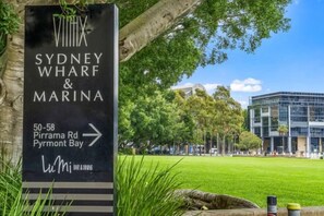 A sign for Vintix Sydney Wharf & Marina with directions to 50-58 Pymmont Rd. - Luxe Living Terrace by The Star - Luxury in Sydney (Pyrmont)