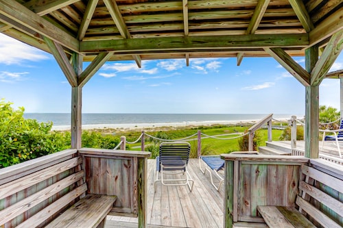 Renovated condo with balcony, lush views, outdoor pool