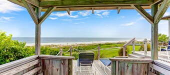 Renovated condo with balcony, lush views, outdoor pool