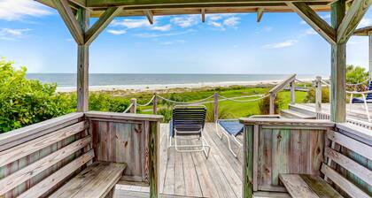 Renovated condo with balcony, lush views, outdoor pool