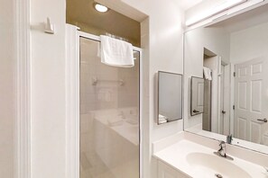 Shower, hair dryer, towels