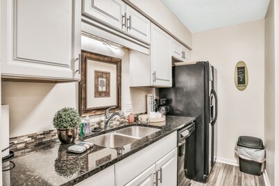 Quiet coastal escape within walking distance to beach with shared pool