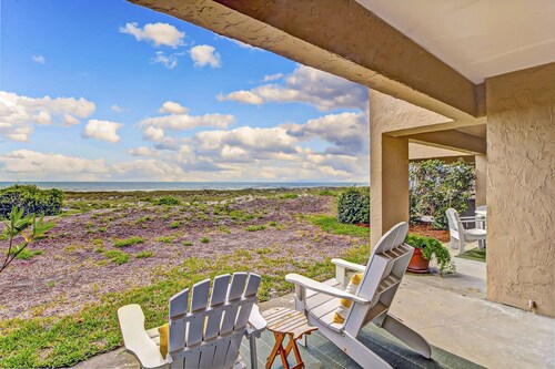 Beachfront condo with outdoor pool, patio & washer/dryer - dog-friendly