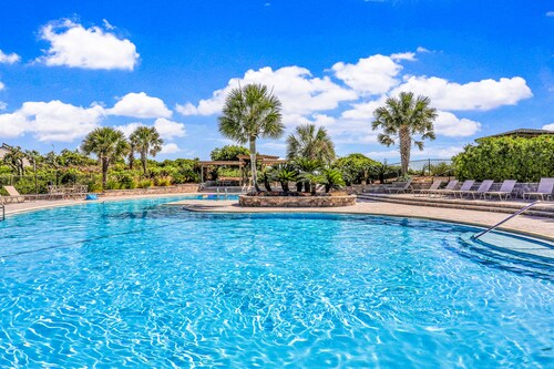 Elegant ocean-view townhome with beach access & pool - perfect location