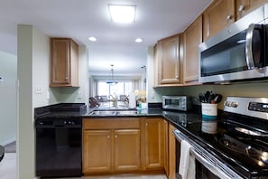 Fridge, microwave, oven, stovetop - Updated, Oceanfront Condo with Balcony, WiFi & Shared Pool/Clay Tennis Courts (Fernandina Beach)
