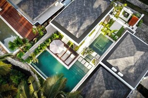 An aerial view of a residential property with a swimming pool, multiple rooms, and outdoor areas. - Villa Ornella by BaliSuperHost (Bali)