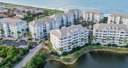 Elegant waterfront condo with central AC, balcony, and shared pools & hot tubs