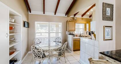 Home near the beach & golf with inviting patio, fireplace, AC, & washer/dryer