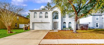 Royal Retreat with enclosed yard and screened in back patio