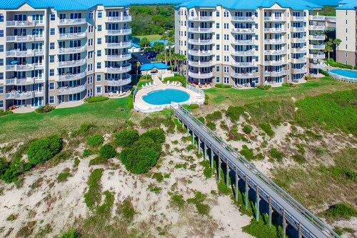 Luxurious oceanfront condo with private balcony,  2 pools, and beach access