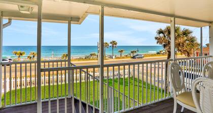 Updated home across from beach with covered balcony, central AC, & washer/dryer