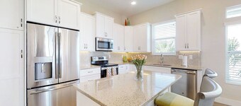 Stylish brand-new ocean view home with deck & porch - steps to beach