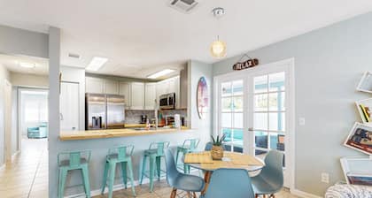 Water-view dog-friendly home with outdoor space & entertainment options