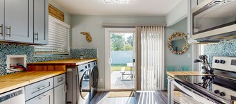 Charming home near beach & golf with central AC & patio - dog-friendly