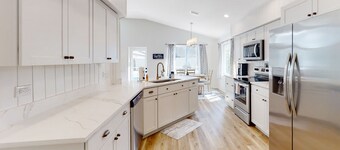 The Barefoot Bungalow | House in Palm Coast with an enclosed pool & grill