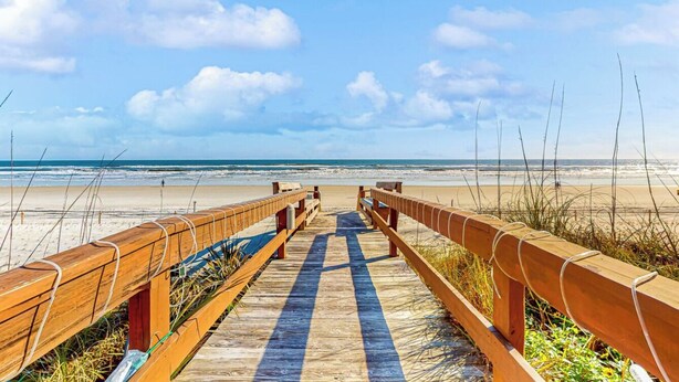 A wooden boardwalk leading to a beach with a clear view of the ocean. - Crescent Beach Retreat, Partial Ocean View, Heated Pool, Tennis & Pickleball (St. Augustine)