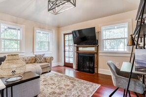 TV, fireplace, books