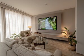 Tinos, Luxury Penthouse | Living area | 50-inch Smart TV with digital channels