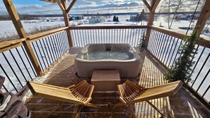 Outdoor spa tub - Coastal Charm Meets Country Calm | Relaxing Cottage with Water Views & Hot Tub (Cocagne)