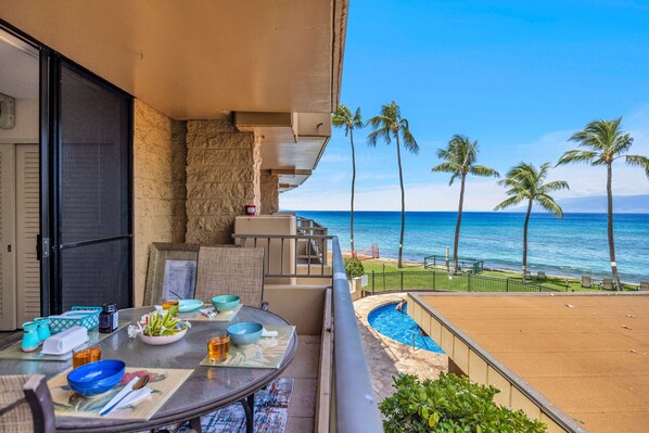 Outdoor dining - Fully Renovated Condo right on the beach with A/C, Wi-Fi and Everything you need (Lahaina)