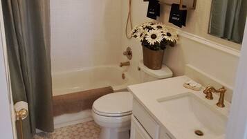 Hair dryer, towels, soap, shampoo