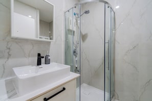 Hair dryer, towels, soap, toilet paper