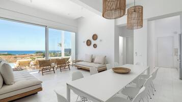 Premier Villa, Balcony, Sea View | Living area